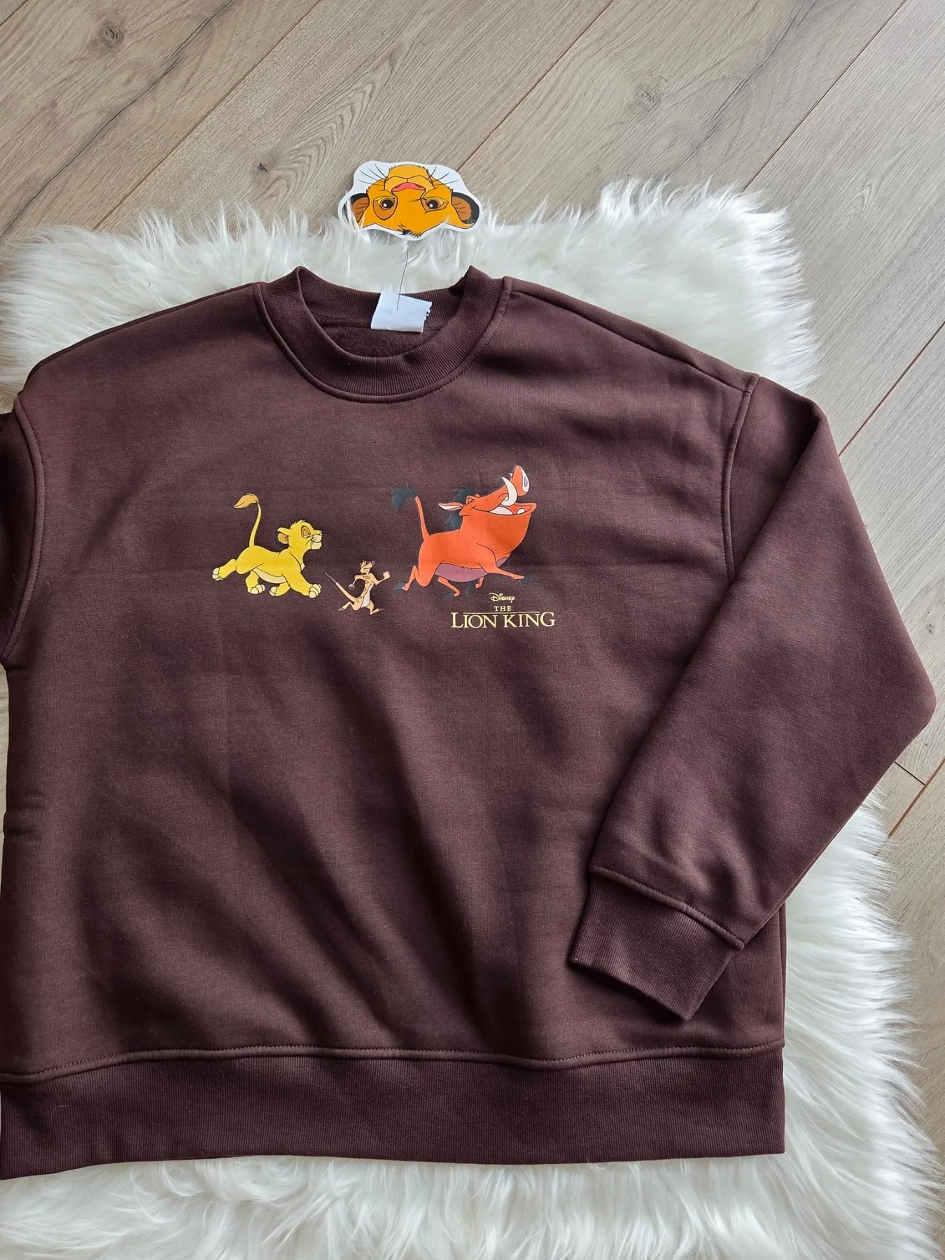 Oroszlánkirály pulóver, Disney női pulóver, barna mintás pulóver, Simba Timon Pumba felső, Hakuna Matata pulóver, mesés női pulóver, barna pamut pulóver, licencelt Disney ruha.